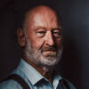 Portrait eines bärtigen Mannnes.